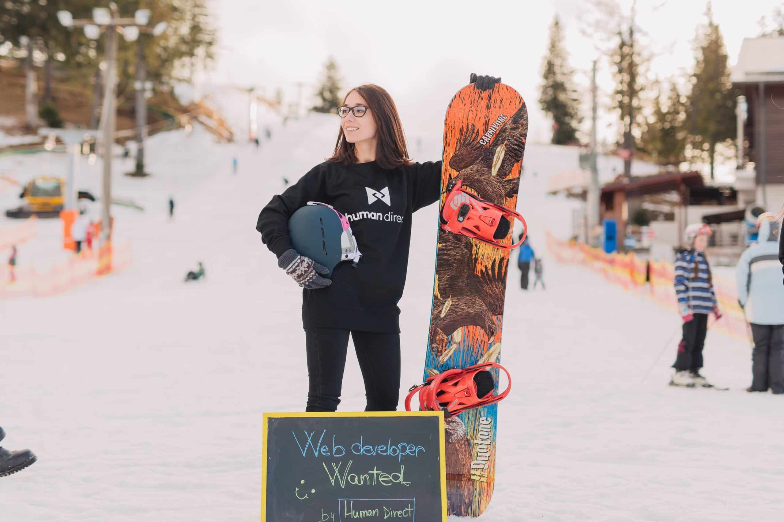 snowboarder with board in offseason